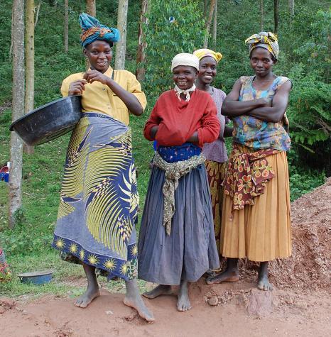 Uganda, 2007. Fairtrade ensures gender equality, and offers working mothers and their children a safe place to work and play