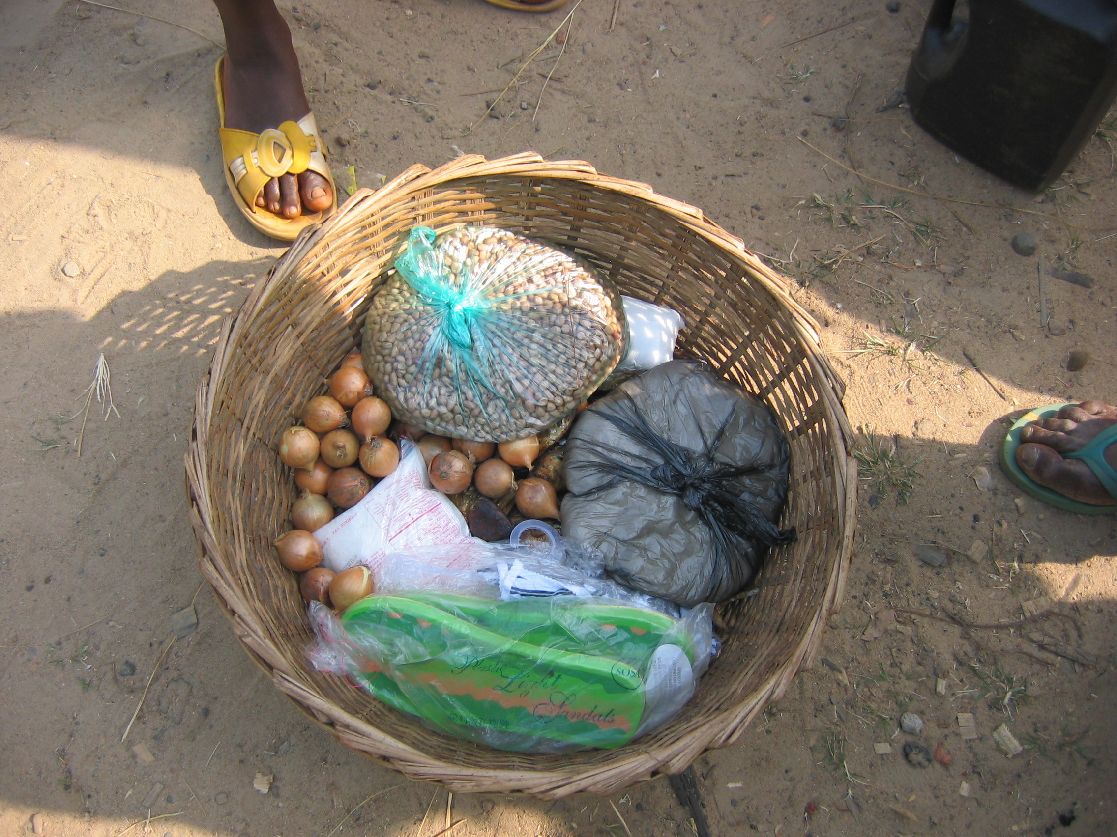 Basket of goods from the market. (c) Estelle Levin
