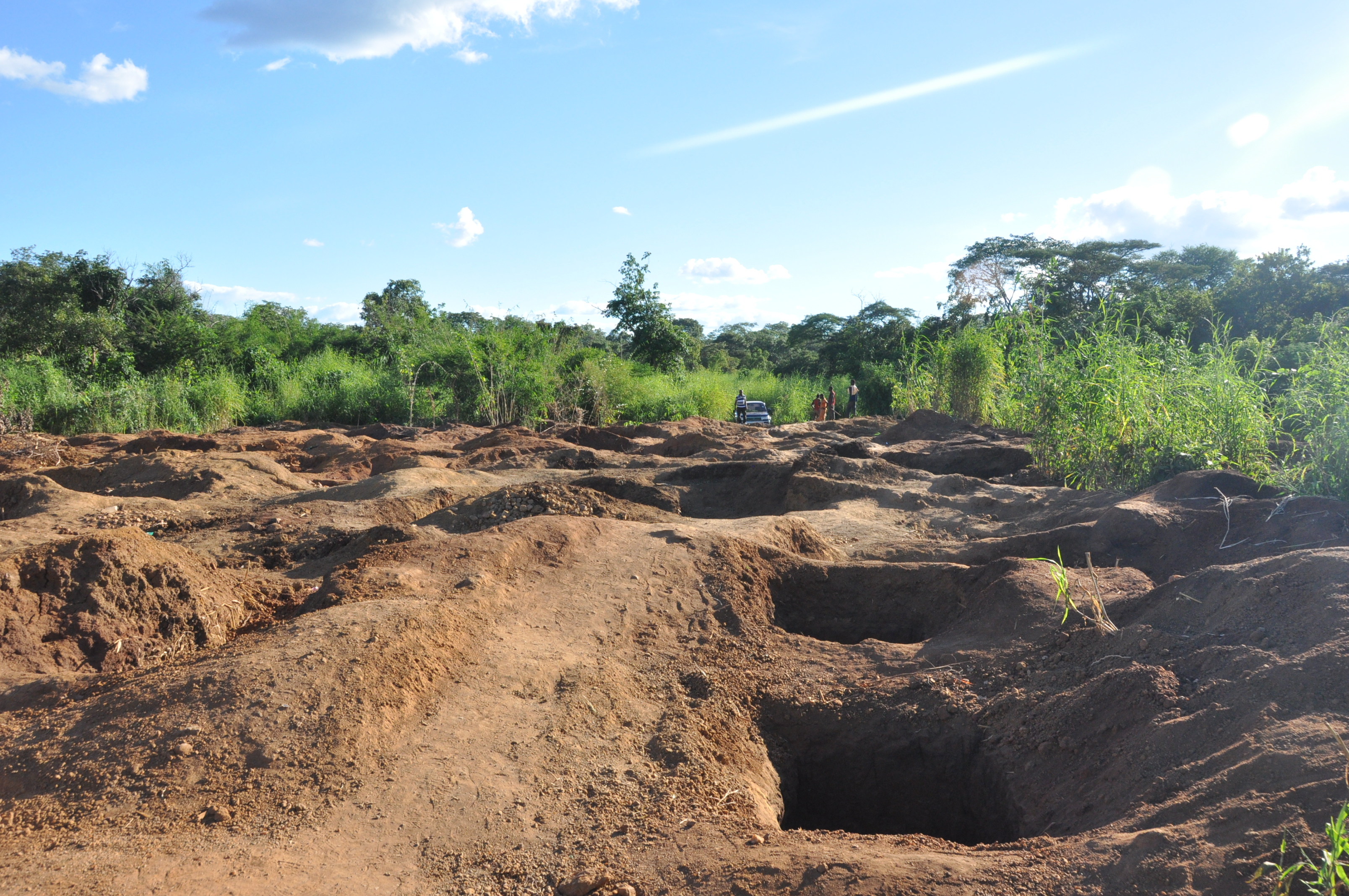 Pits of an ASM rush site on an industrial concession